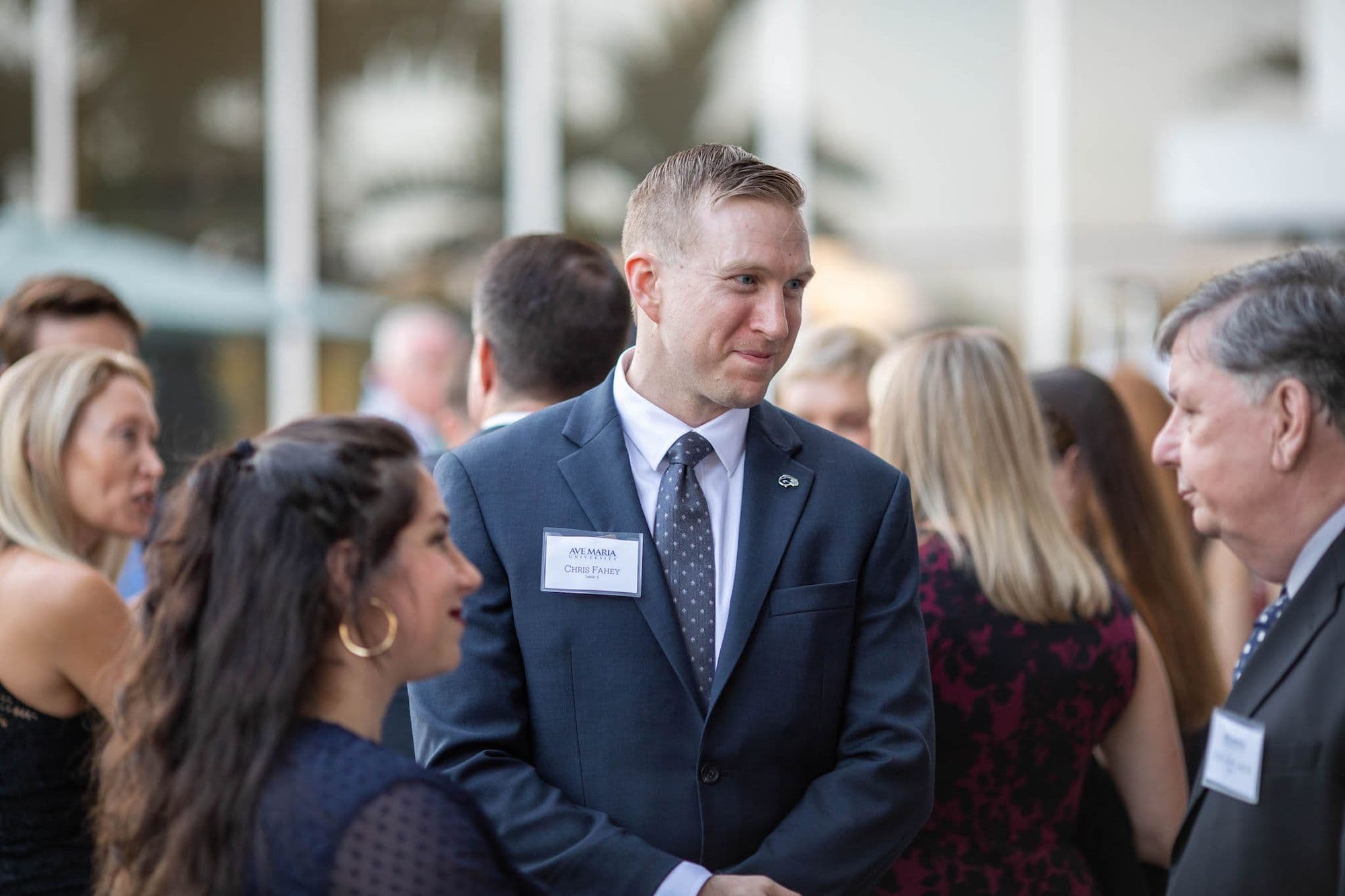 Institute scholars networking in professional attire